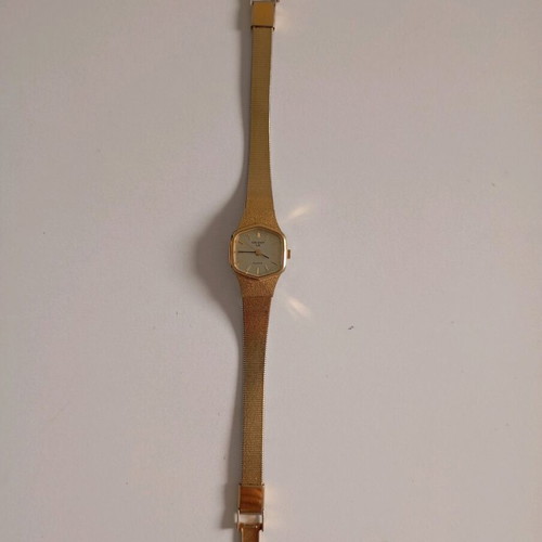 Orient vintage women's watch used, gold color, needs repair