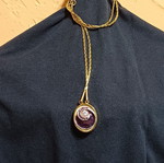 Pendant with spiral design and crystal, like new