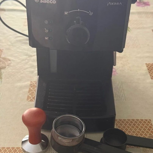 Philips Saeco Poemia Espresso machine used with filter and tamper