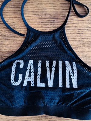 Calvin Klein swimwear top, size small, black