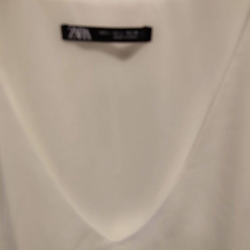 Zara sleeveless beige top like new, size large