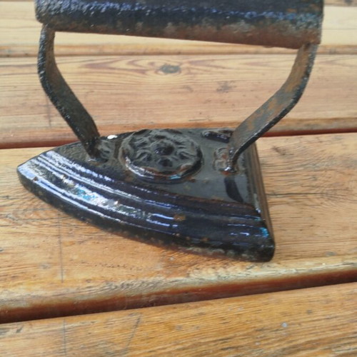 Old cast iron clothes iron used