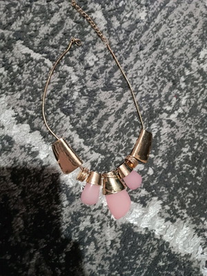 Necklace like new, pink stainless steel that does not tarnish