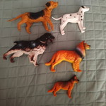 Plastic dog figures set used, 4 large and 1 small