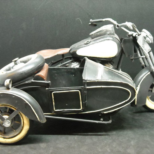 Decorative vintage Harley Davidson type motorcycle with sidecar used