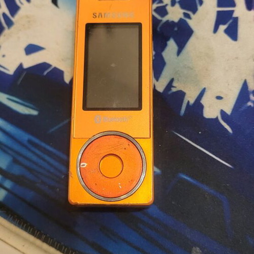Samsung SGH-X830 used orange phone with charger