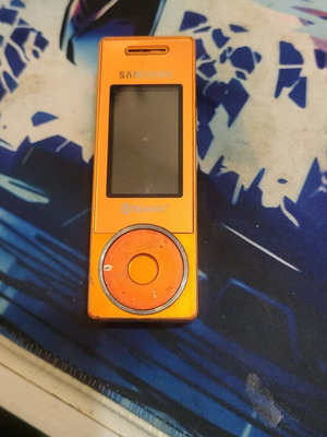 Samsung SGH-X830 used orange phone with charger