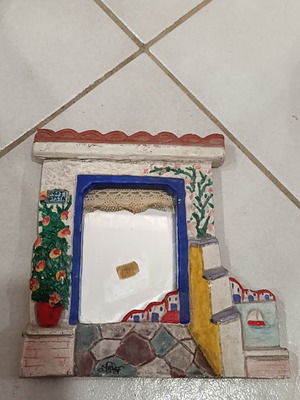Handmade vintage wall hanging with small mirror