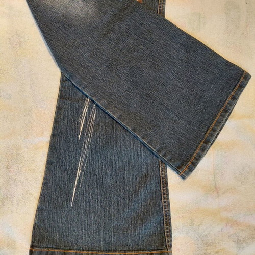 Jeans like new with colorful geometric details