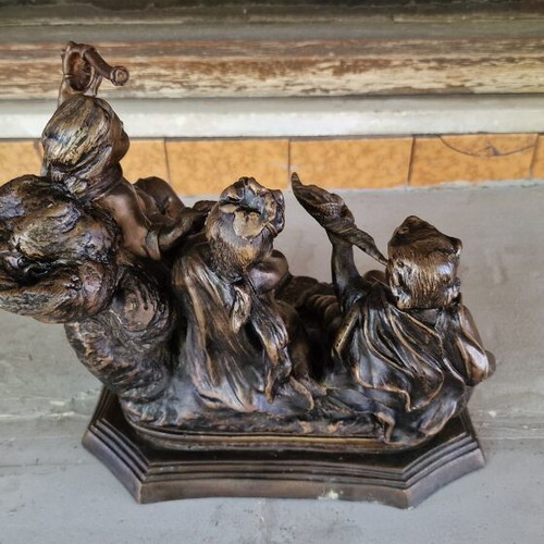 Bronze sculpture of three children putti, used
