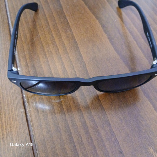 Swing sunglasses new with black plastic frame and men's lenses