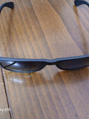 Swing sunglasses new with black plastic frame and men's lenses