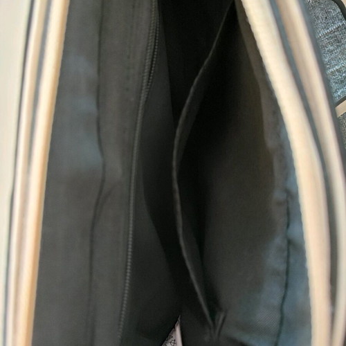 Beige crossbody bag used with adjustable strap