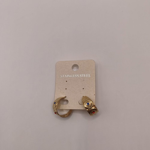 Wide stainless steel hoop earrings with embossed suns and colored crystals
