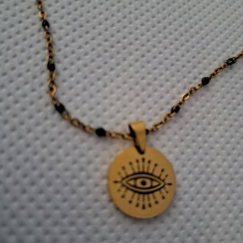 Eye necklace new, gold color, very special