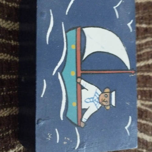 Wooden storage box with nautical design