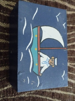 Wooden storage box with nautical design