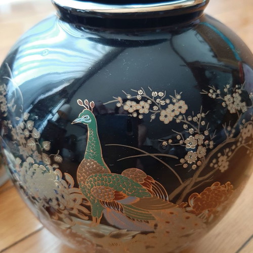 Porcelain vase used with Asian design, black