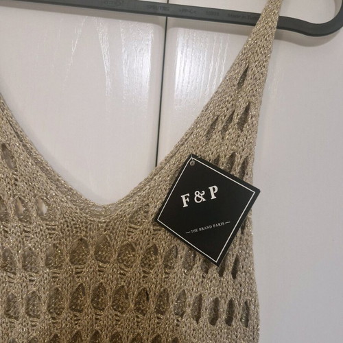 Elastic knitted dress new, gold with fringes