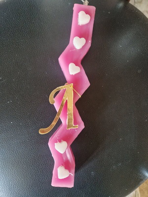 Handmade Easter candle with customizable color and letter