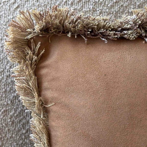 Pillow used in camel color with fringes