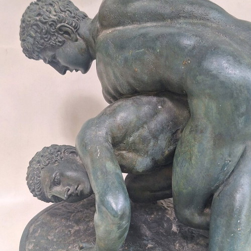 Gypsum statue with ancient Greek pankration athletes used