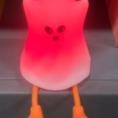 Silicone ghost night light with adjustable brightness and orange feet