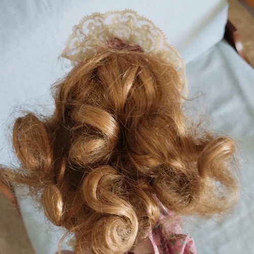 Porcelain doll vintage used with hand damage