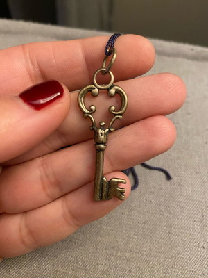 Key-shaped charm in 925 silver like new