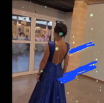 Diamond blue dress like new, open back with shoulder pads