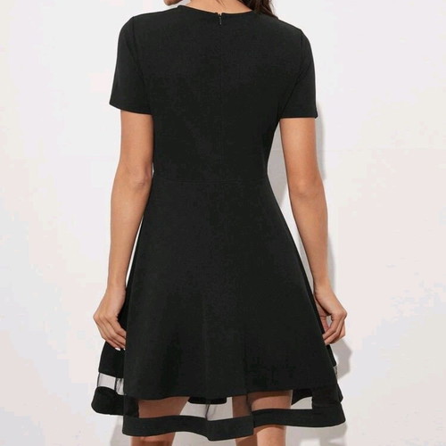 Black flared dress with transparency size Medium, never worn