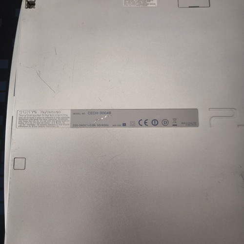 Sony PlayStation 3 Slim Satin Silver 320GB console with original DualShock 3 used