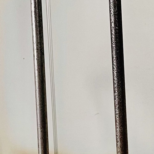 Vintage brass candlesticks with thin iron stems used
