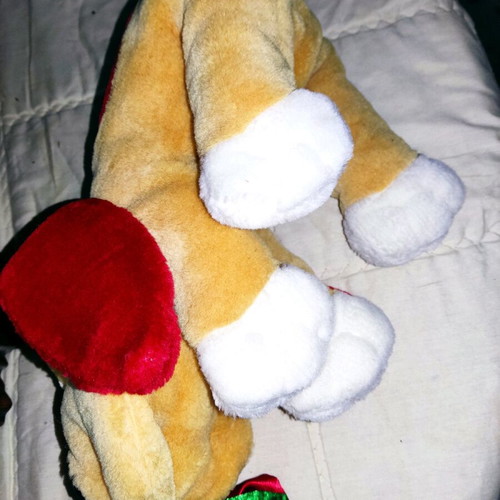 Stuffed dog used with heart and flower