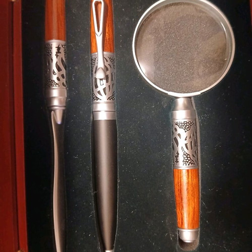 Set with magnifying glass, pen and letter opener in wooden case like new
