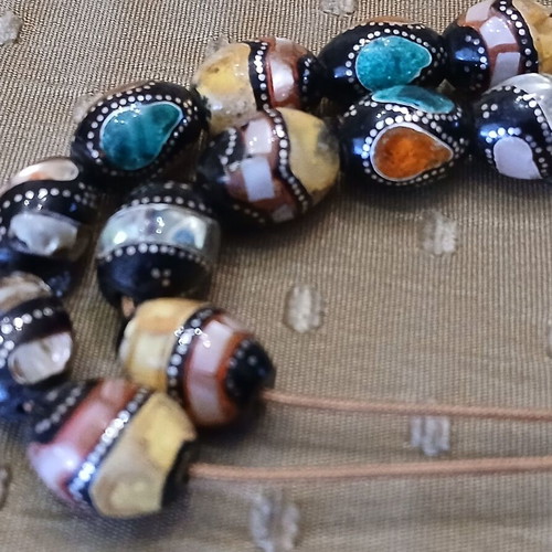 Yiousouri Worry Beads used with amber, mother-of-pearl and silver embroidery