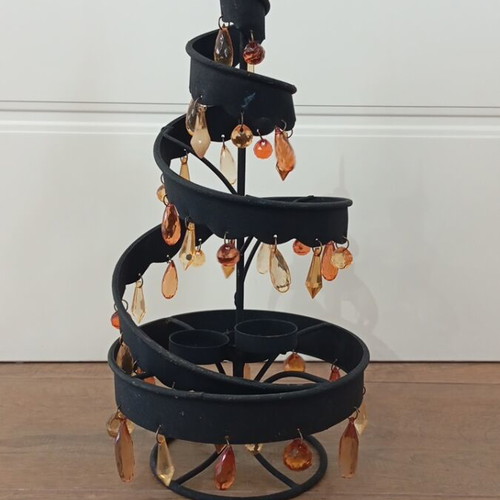 Black metal candle holder with 3 candle slots