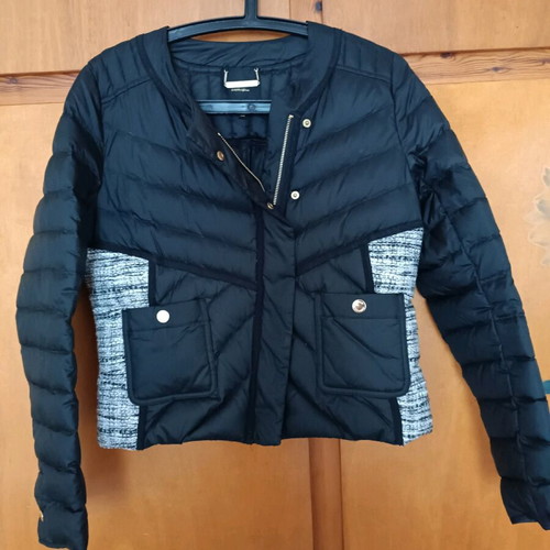 Juicy Couture jacket with down lining size Medium like new, black and white