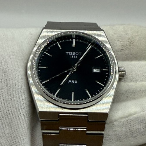 Tissot PRX Quartz watch with black dial