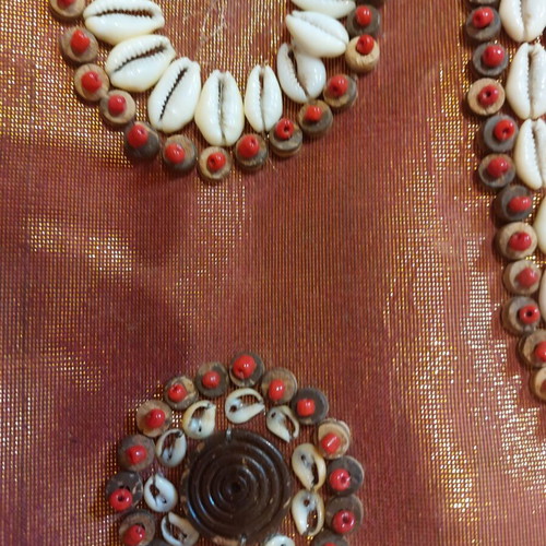 Handmade summer handbag in like new condition with shells and wooden handle orange