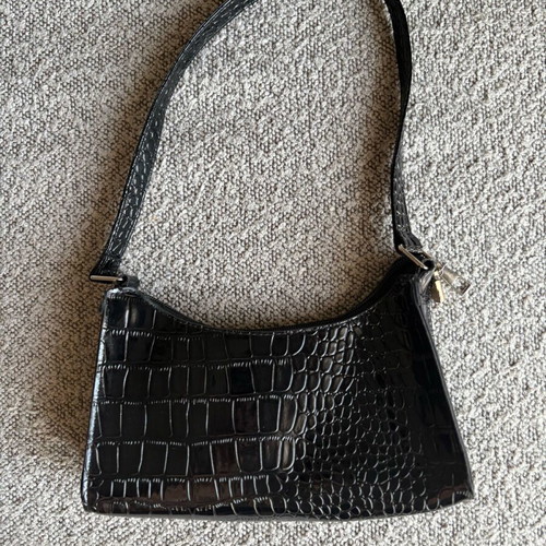 Shoulder bag like new, black with embossed patterns