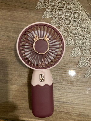 Portable fan like new with rechargeable battery
