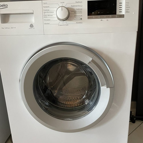 Washing machine like new, 7 kg load capacity
