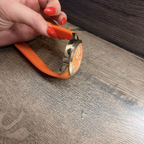 Loisir women's wristwatch like new, orange and gold