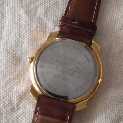 Benetton unisex watch like new, gold color