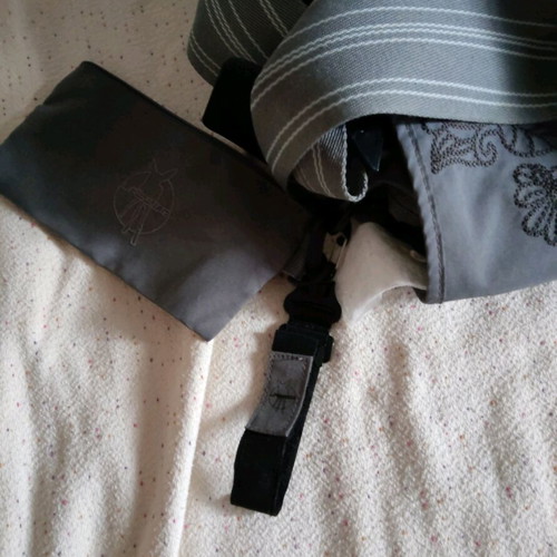 Lassig changing bag used, messenger with strap and spacious compartments