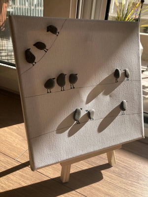 Minimal handmade canvas with natural sea stones