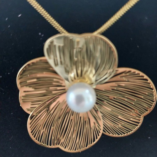 Steel necklace flower with pearl unused