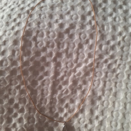 Drop necklace with beige cord and silver tear pendant like new