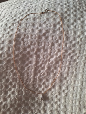 Drop necklace with beige cord and silver tear pendant like new
